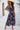 Devine Smocked Floral V-Neck Short Sleeve Dress - Aspire Alley