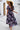Devine Smocked Floral V-Neck Short Sleeve Dress - Aspire Alley