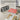 FlexiLine Retractable Invisible Clothesline mounted on wall with clothes hanging indoors - Aspire Alley