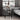 GlassEdge coffee table with clear tempered glass top in a minimalist living room