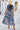 Devine Smocked Floral V-Neck Short Sleeve Dress - Aspire Alley