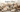Serene winter wellness scene featuring premium self-care products including massage tools, facial essence, and wellness essentials from Aspire Alley